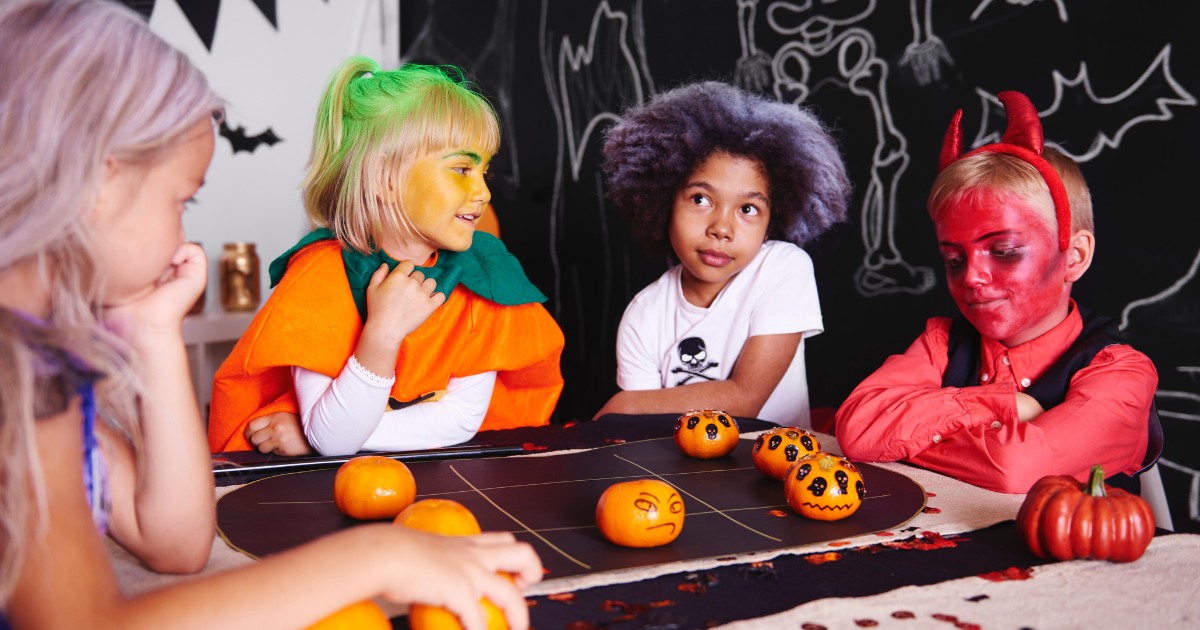 Children playing Halloween classroom games.